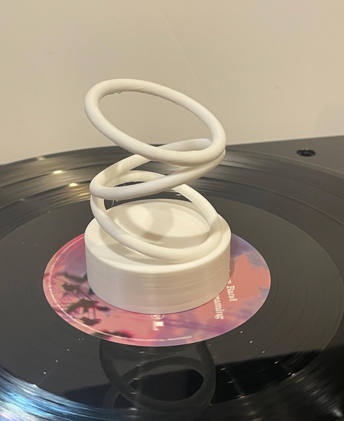 Rotating rings vinyl charm record accessory